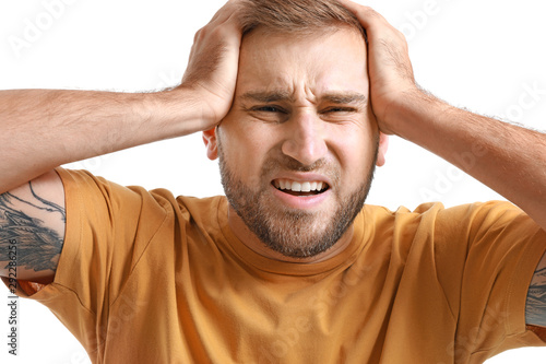 Young man suffering from he...