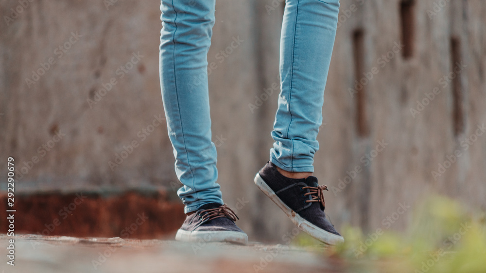 Low angle shot of the shoes of the man Low angle shot of the shoes of the man