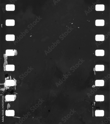 Fotografie, Tablou original filmstrip with empty dusty frames or cells and nice texture on the bord