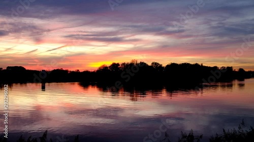 Wallpaper Mural Fall sunset over a river with a colourful sky above Torontodigital.ca