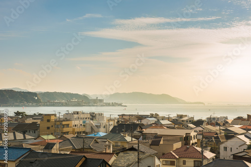 View of Yuigahama Beach and Sagami bay in late afternoon when looking from the viewpoint of Hase-dera temple at Kamakura. Kanagawa,Japan.