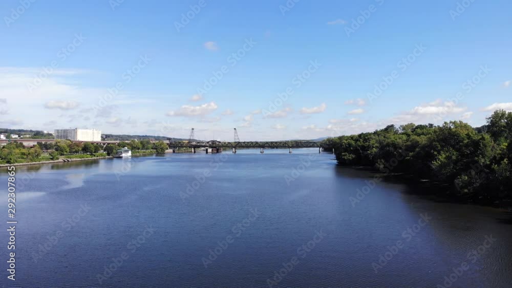 aerial over water near train bridge aerial over water near train bridge