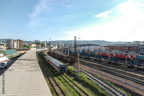 Railway station with freight and passenger trains in the city of Krasnoyarsk