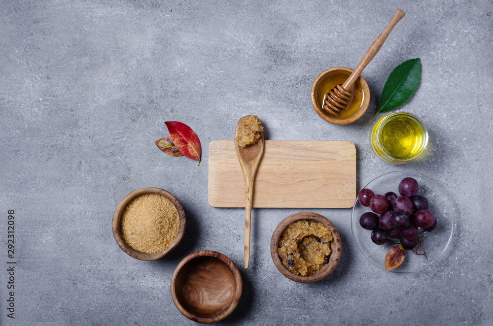 Ingredients for body scrub of brown sugar with grape and oil, eco bio friendly cosmetic for skin care. Ingredients for body scrub of brown sugar with grape and oil, eco bio friendly cosmetic for skin care.