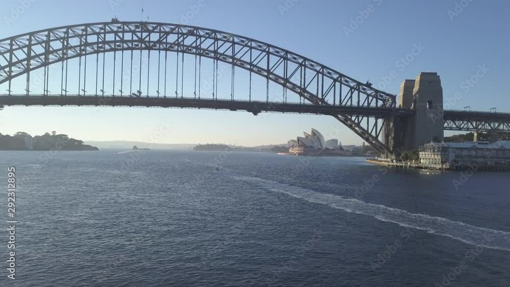 Sydney Harbour Bridge, Australia | 4K UHDStunning sunrise drone shot of the harbour bridge, with the Sydney Opera House in the background. Sydney Harbour Bridge, Australia | 4K UHDStunning sunrise drone shot of the harbour bridge, with the Sydney Opera House in the background.