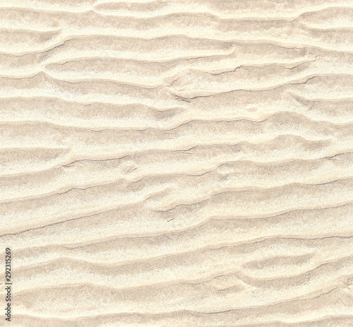 Seamless pattern of white sand. Repeating texture of waves on sandy beach background