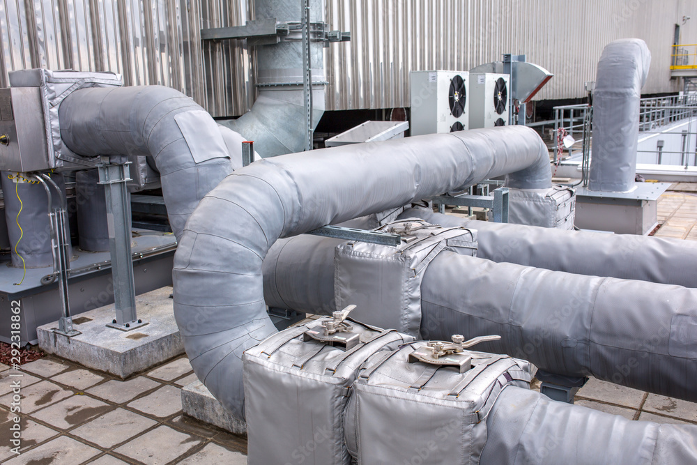 External infrastructure of the microclimate support system at a large industrial site. Air pipelines inlet and exhaust. Fans and air conditioning. Systems of control of pressure, humidity, temperature External infrastructure of the microclimate support system at a large industrial site. Air pipelines inlet and exhaust. Fans and air conditioning. Systems of control of pressure, humidity, temperature