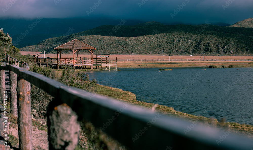 Obraz premium landscape with lagoon and mountains in the background