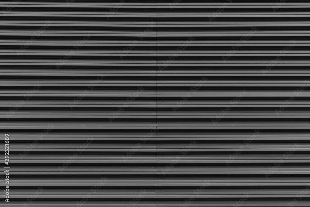 Garage entrance gate with galvanized metal surface, exterior design