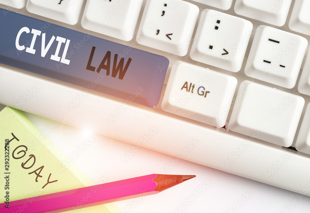 Writing note showing Civil Law. Business concept for Law concerned with private relations between members of community White pc keyboard with note paper above the white background Writing note showing Civil Law. Business concept for Law concerned with private relations between members of community White pc keyboard with note paper above the white background
