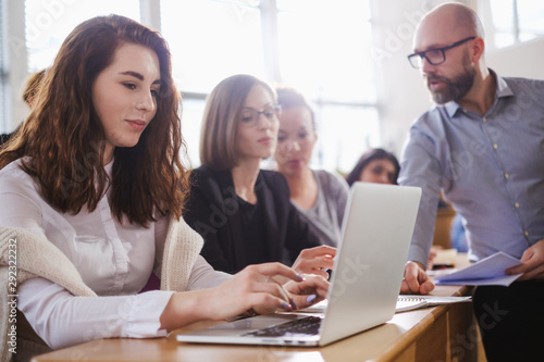 Wallpaper Mural Lecturer and multinational group of students in an auditorium Torontodigital.ca