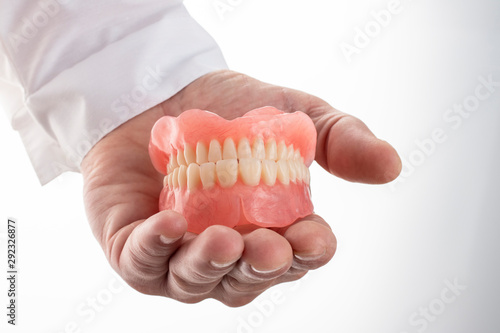 False teeth prosthesis. Doctor Dentist.