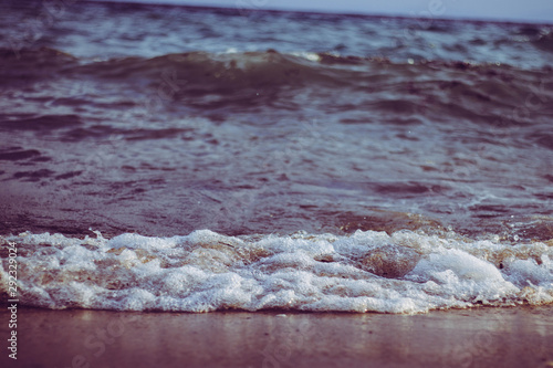 Wave of sea on beach in Kallithea, Greece