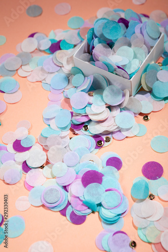 Festive background with color paper confetti