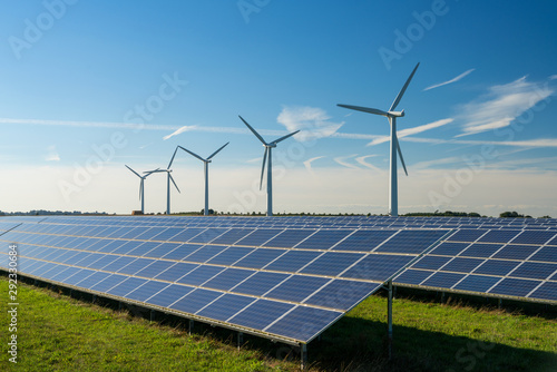 Wind turbine energy generaters on wind farm photo