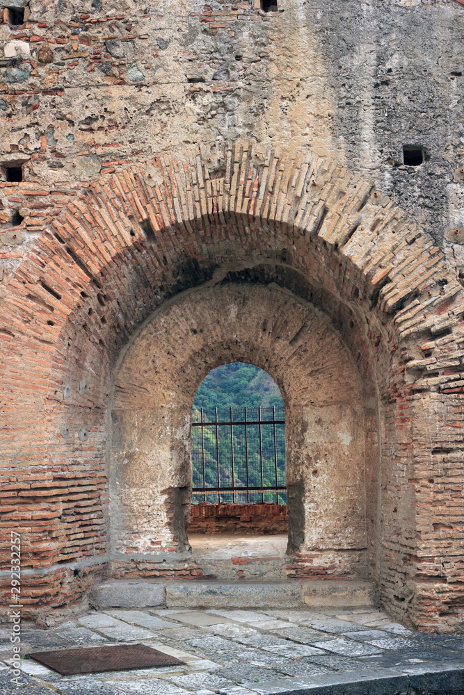 The tactical defense window of ancient Ruffo Castle, Scilla, Italy