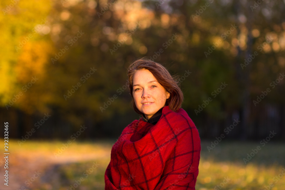 Portrait of middle aged woman in autumn park Portrait of middle aged woman in autumn park