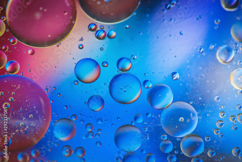 Multicolored abstract defocused background picture made with oil, water and soap