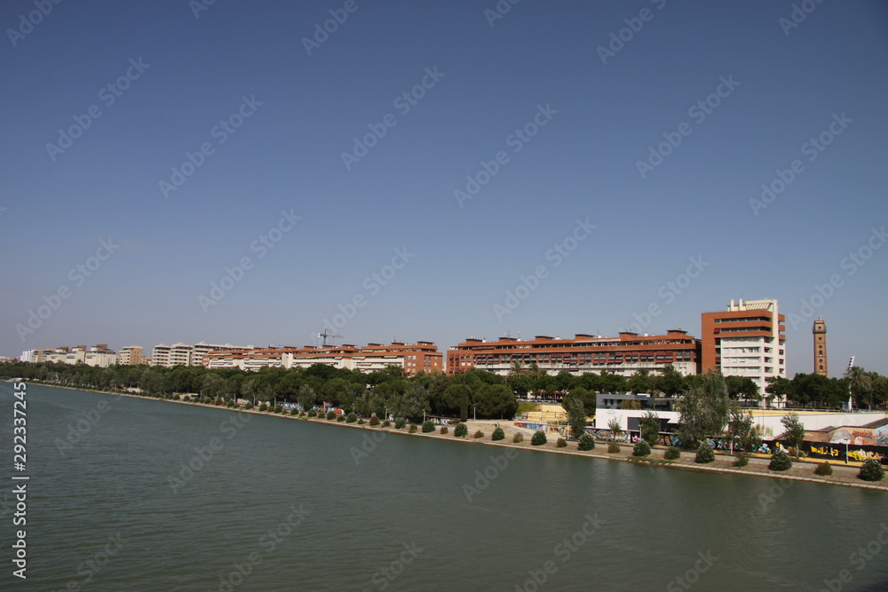 View of modern Seville from the Barquette Bridge