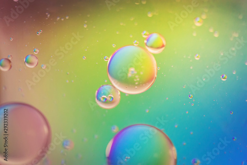 Rainbow abstract defocused background picture made with oil, water and soap