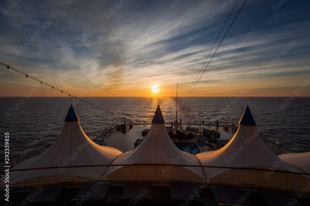 Awesome sunset seen from the stern of a cruise ship