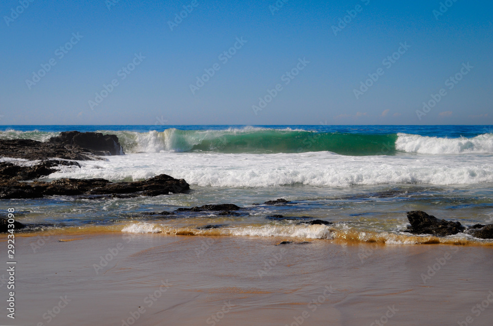 Beach to sea view, with waves breaking on the beach, North Valla Beach, NSW, Australia Beach to sea view, with waves breaking on the beach, North Valla Beach, NSW, Australia
