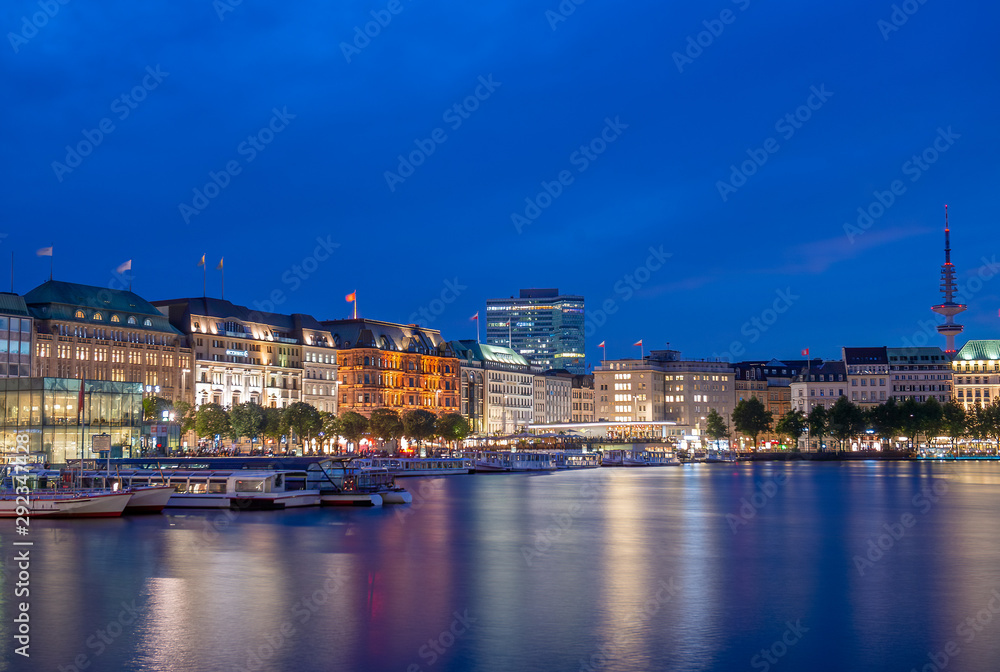Hamburg Binnenalster at night with city buildings, Germany