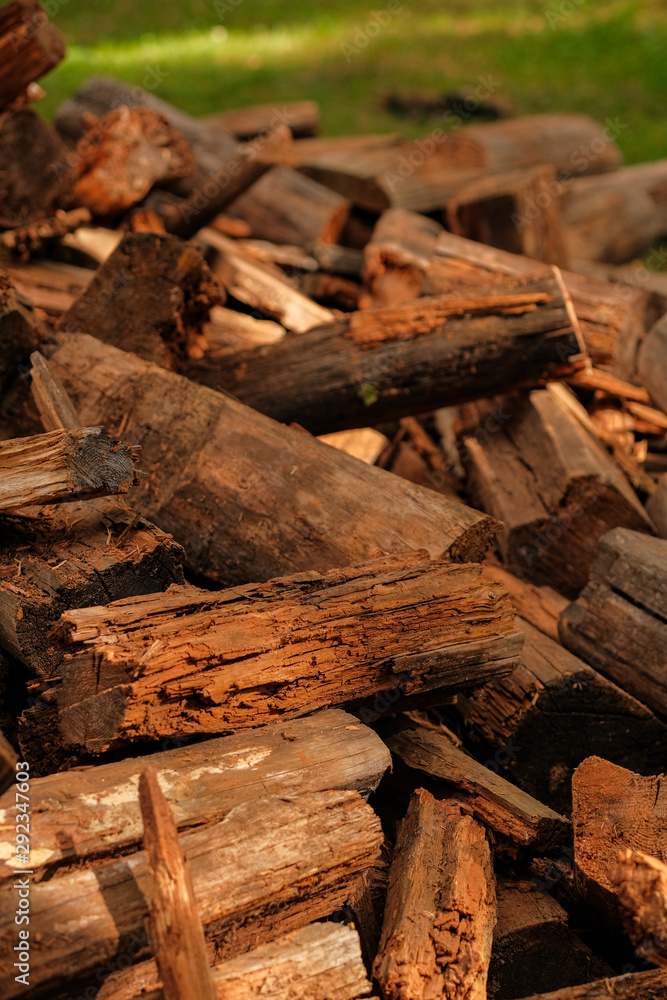 A pile of old wood from house building. Wood recycling. Eco environment concept. A pile of old wood from house building. Wood recycling. Eco environment concept.