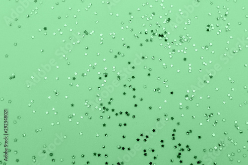 Mint, trendy, cool background with green stars.