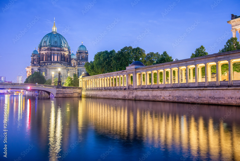 Berlin Cathedral at night along city river, Germany