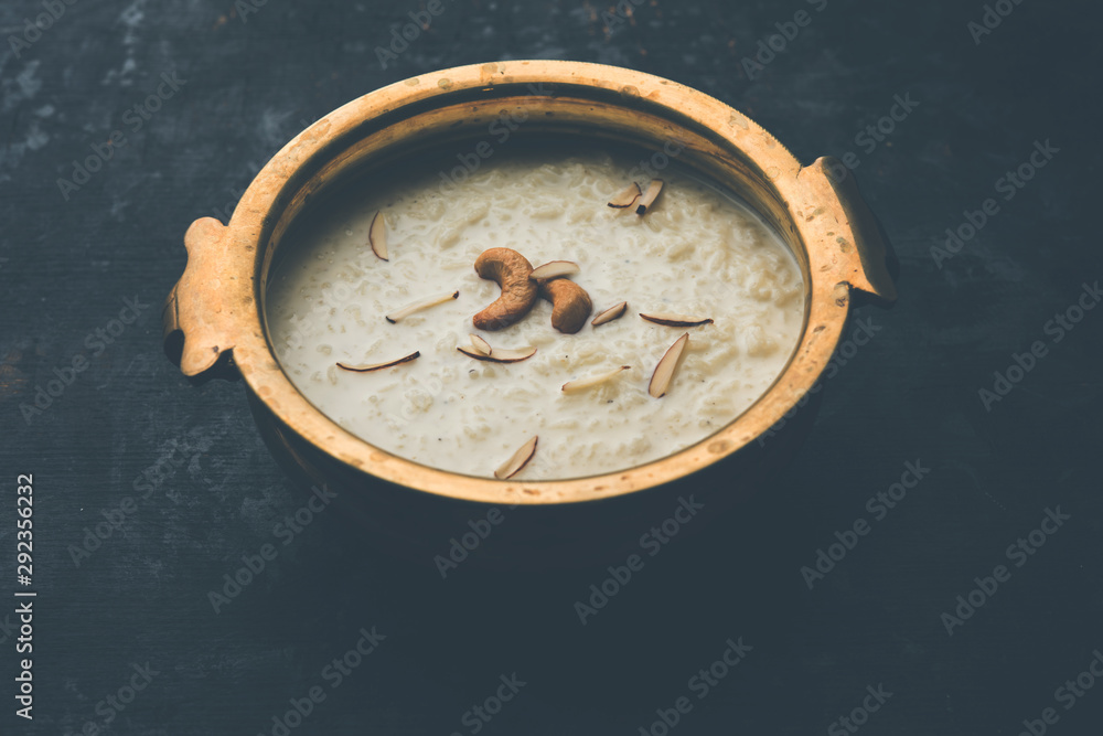 Rice Kheer or Firni or Khir is a pudding from Indian subcontinent, made by boiling milk ,sugar and Rice. Served in a bowl Rice Kheer or Firni or Khir is a pudding from Indian subcontinent, made by boiling milk ,sugar and Rice. Served in a bowl