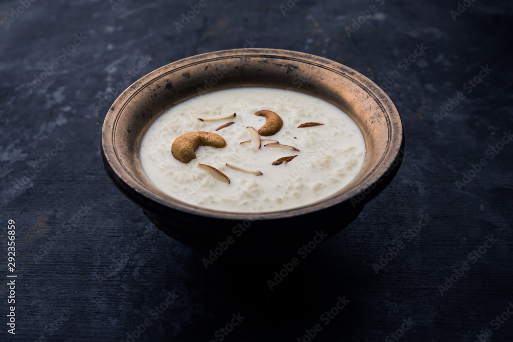 Rice Kheer or Firni or Khir is a pudding from Indian subcontinent, made by boiling milk ,sugar and Rice. Served in a bowl Rice Kheer or Firni or Khir is a pudding from Indian subcontinent, made by boiling milk ,sugar and Rice. Served in a bowl