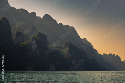 Limestone mountains with trees in the sea in Thailand © iSomboon