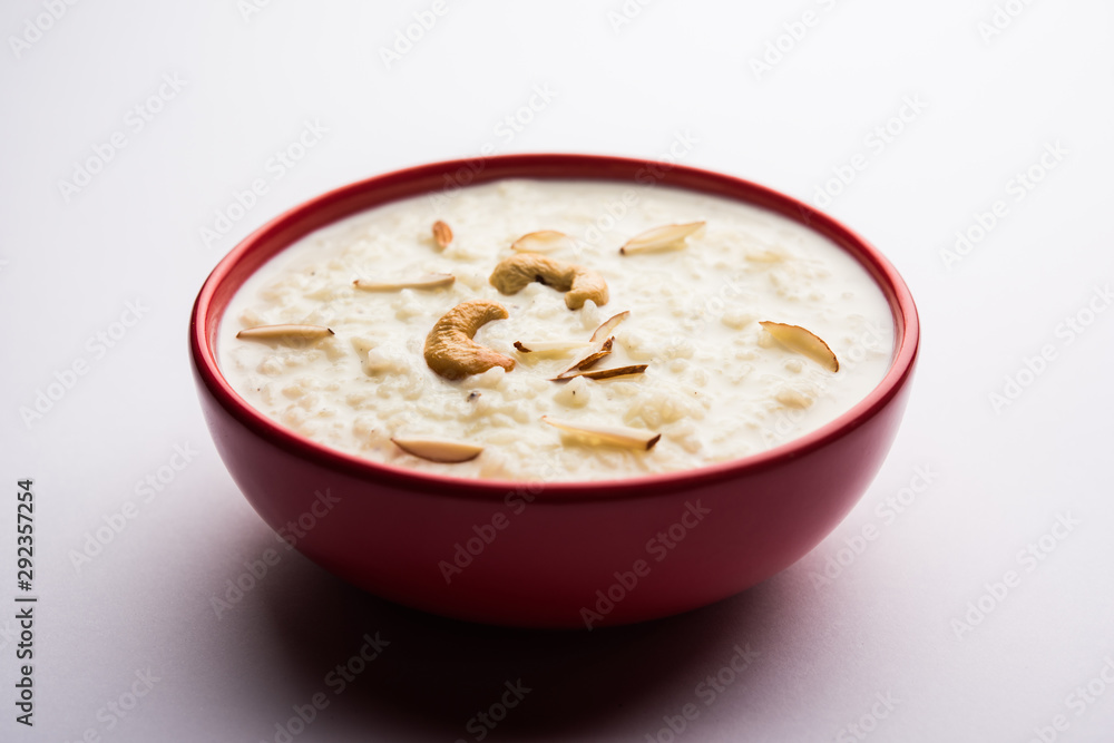 Rice Kheer or Firni or Khir is a pudding from Indian subcontinent, made by boiling milk ,sugar and Rice. Served in a bowl Rice Kheer or Firni or Khir is a pudding from Indian subcontinent, made by boiling milk ,sugar and Rice. Served in a bowl