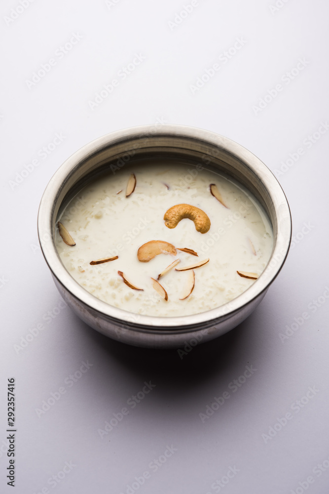 Rice Kheer or Firni or Khir is a pudding from Indian subcontinent, made by boiling milk ,sugar and Rice. Served in a bowl Rice Kheer or Firni or Khir is a pudding from Indian subcontinent, made by boiling milk ,sugar and Rice. Served in a bowl