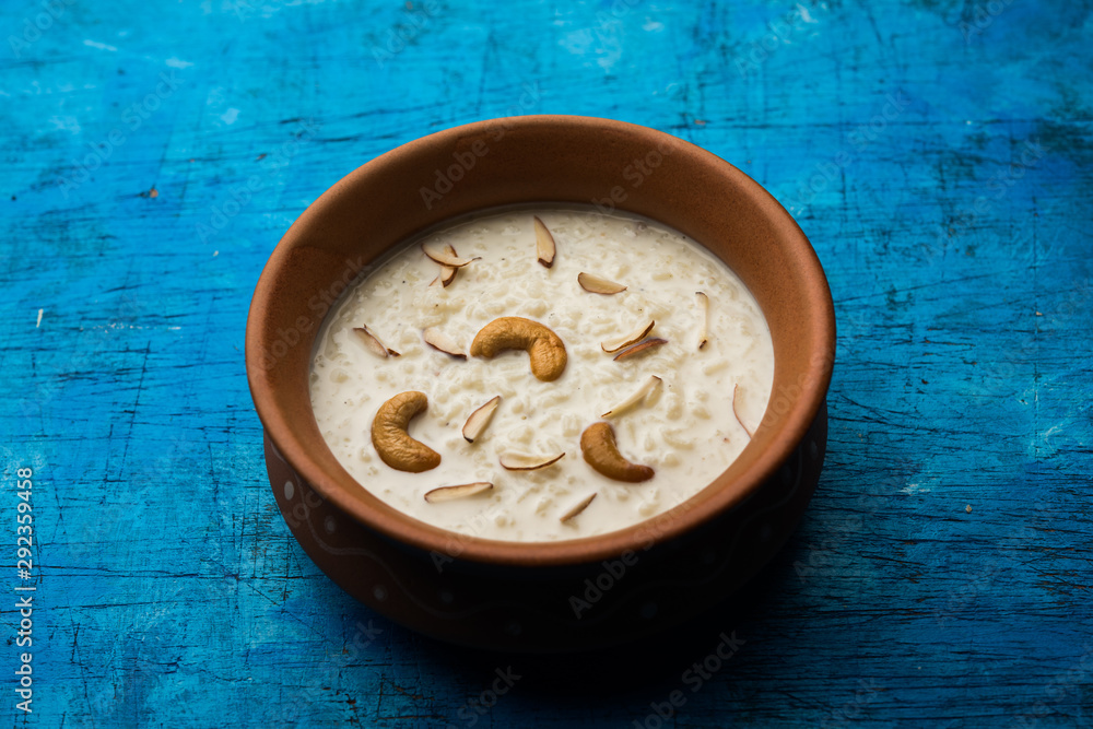 Rice Kheer or Firni or Chawal ki Khir is a pudding from Indian subcontinent, made by boiling milk ,sugar and Rice. Served in a bowl Rice Kheer or Firni or Chawal ki Khir is a pudding from Indian subcontinent, made by boiling milk ,sugar and Rice. Served in a bowl