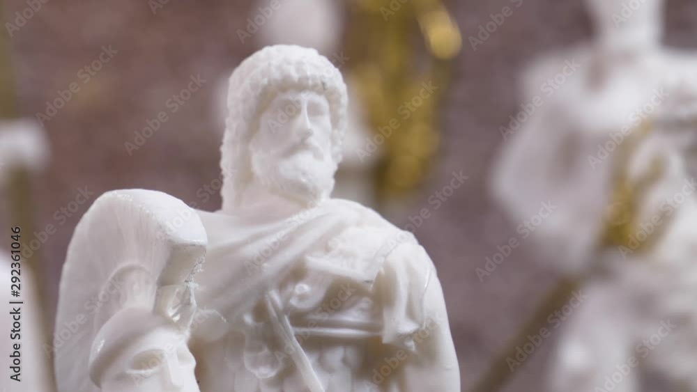 Ares greek god statue surrounded by other greek gods statues. Camera turning around Ares greek god statue surrounded by other greek gods statues. Camera turning around