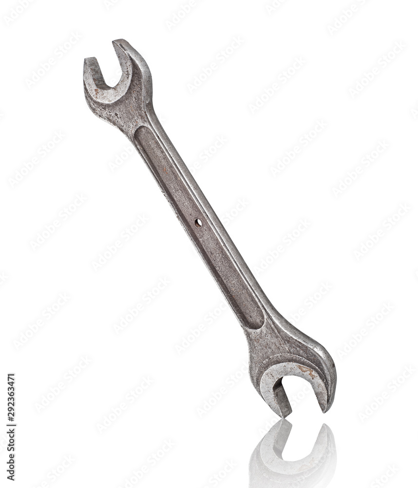 old wrench with reflection on isolated white background old wrench with reflection on isolated white background