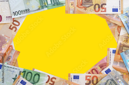 Mocup of Euro banknotes. Financial background. Different Euro banknotes frame. Business, finance, investment, saving and corruption concept. Closeup of Euro money over concrete background. photo