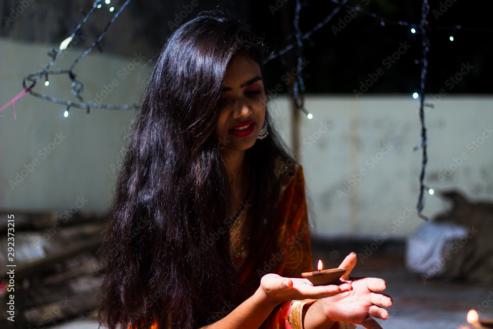 young woman decorating stairs with diyas on diwali Stock Photo - Alamy-gemektower.com.vn