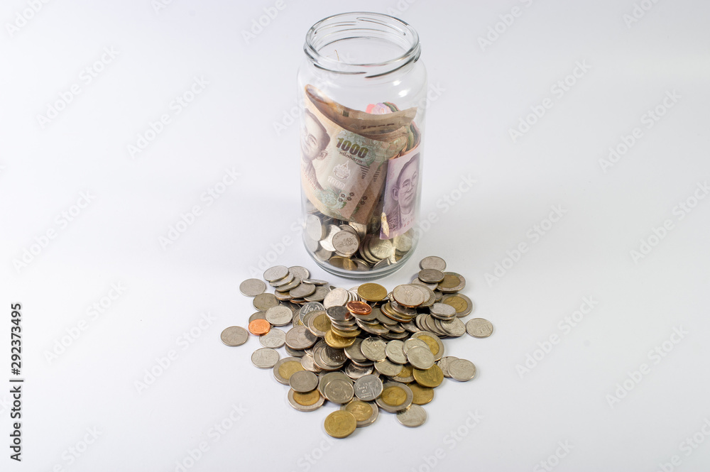 Saving money, saving money for the future ahead of life. And silver on a white background Saving money, saving money for the future ahead of life. And silver on a white background