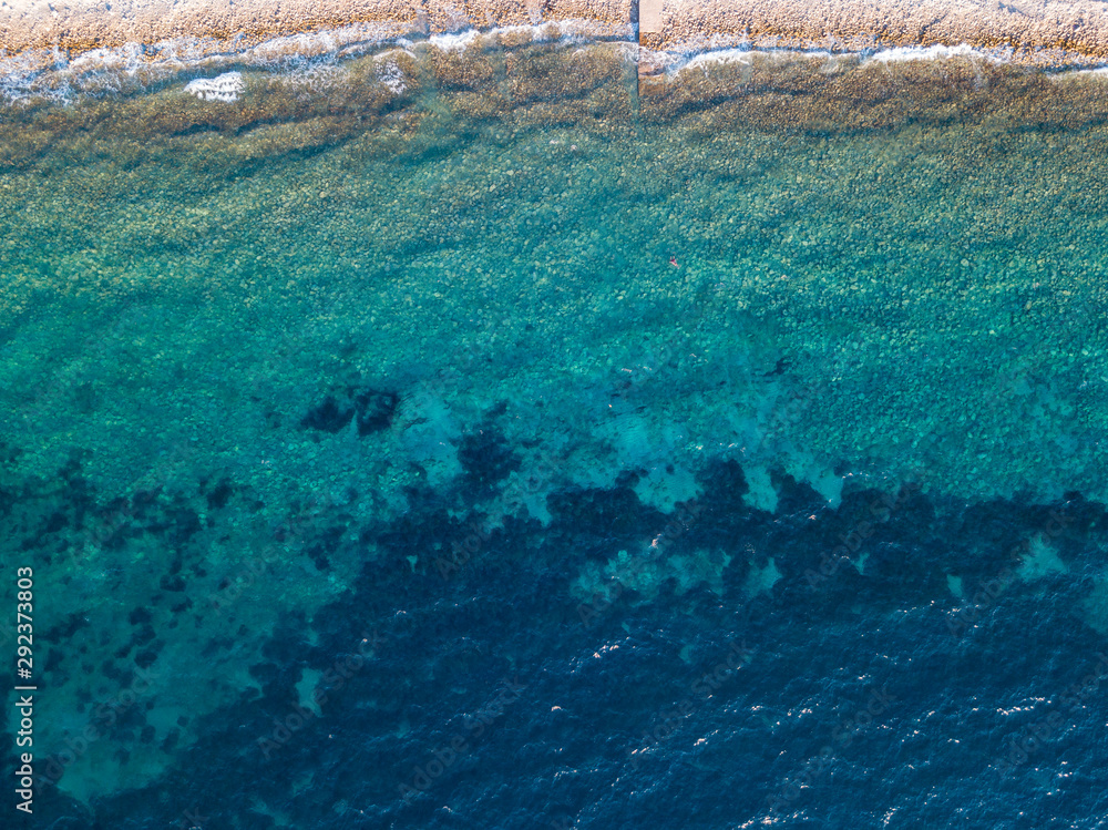 Aerial view of a seabed seen from above, sunset time, Adriatic sea, Montenegro