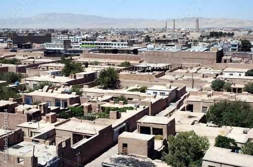 A view across the city of Herat in Afghanistan from Herat Citadel. The view shows the Musalla Minarets and Gawhar Shad Mausoleum, important historical sites in Western Afghanistan. August 2005. photo