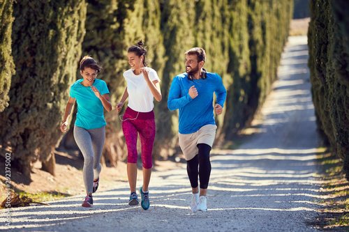 group of sporty friends jogging.