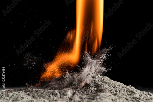 burst of burning sand  particle burst and freeze motion