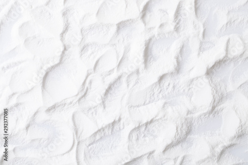 Background baking soda powder scattered on white background.