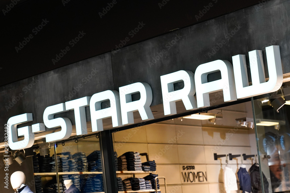 sign G-STAR RAW Logo G-Star shop Stock Photo | Adobe Stock