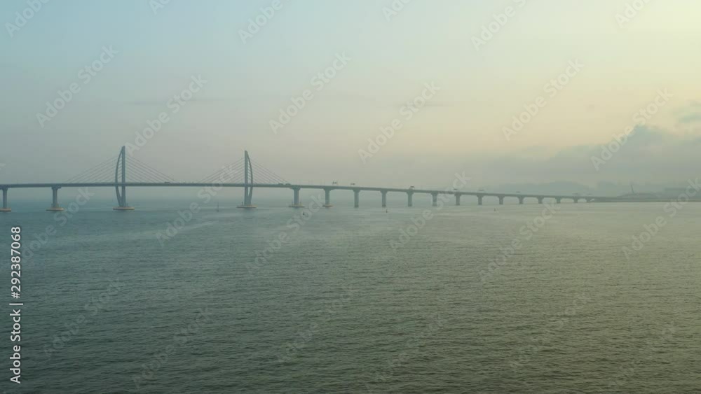 sunset sky flight over famous macau hong kong traffic bridge aerial panorama 4k china sunset sky flight over famous macau hong kong traffic bridge aerial panorama 4k china