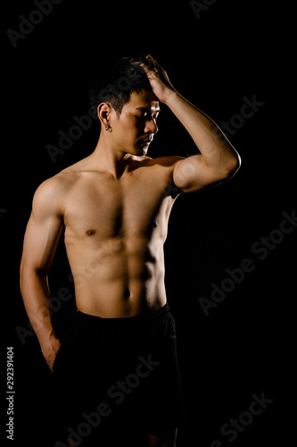athletic muscular bodybuilder man with naked torso six pack abs. fitness workout concept © 88studio