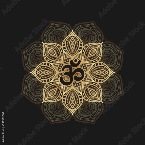 Black om symbol on golden floral pattern